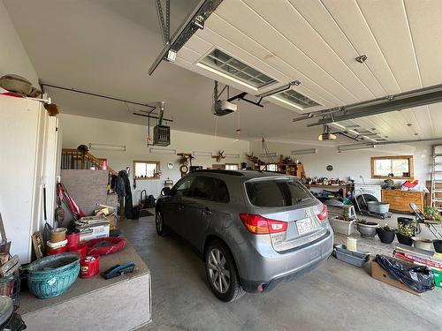 11512 Range Road 63, Rural Cypress County, AB - Indoor Photo Showing Garage