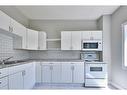 819 3 Street Se, Medicine Hat, AB  - Indoor Photo Showing Kitchen With Double Sink 
