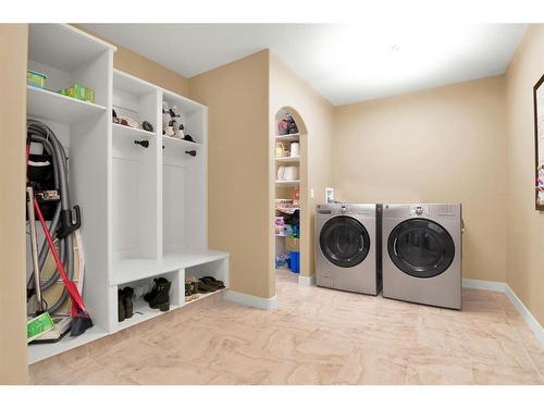 27 Links Place Sw, Desert Blume, AB - Indoor Photo Showing Laundry Room