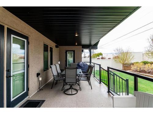 27 Links Place Sw, Desert Blume, AB - Outdoor With Deck Patio Veranda With Exterior