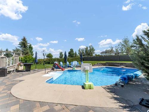 5119B Township Road 114, Rural Cypress County, AB - Outdoor With In Ground Pool With Backyard