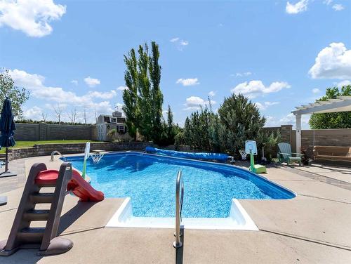 5119B Township Road 114, Rural Cypress County, AB - Outdoor With In Ground Pool With Backyard