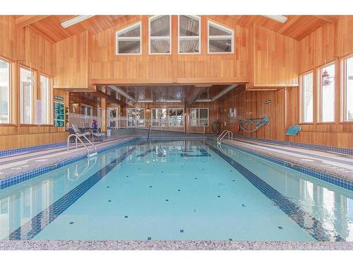 312-1535 Southview Drive Se, Medicine Hat, AB - Indoor Photo Showing Other Room With In Ground Pool