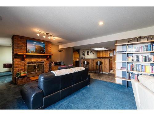 594 Ross Glen Drive Se, Medicine Hat, AB - Indoor With Fireplace
