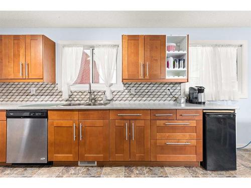 36 Harris Street Sw, Medicine Hat, AB - Indoor Photo Showing Kitchen With Double Sink