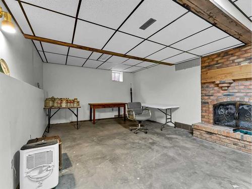 11010 Highway 887, Rural Cypress County, AB - Indoor Photo Showing Other Room With Fireplace