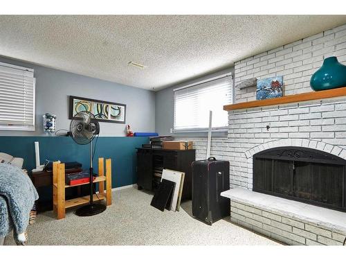 17 Rossdale Drive Se, Medicine Hat, AB - Indoor With Fireplace