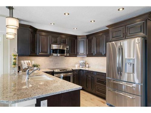 1442-2330 Fish Creek Boulevard Sw, Calgary, AB - Indoor Photo Showing Kitchen With Double Sink With Upgraded Kitchen