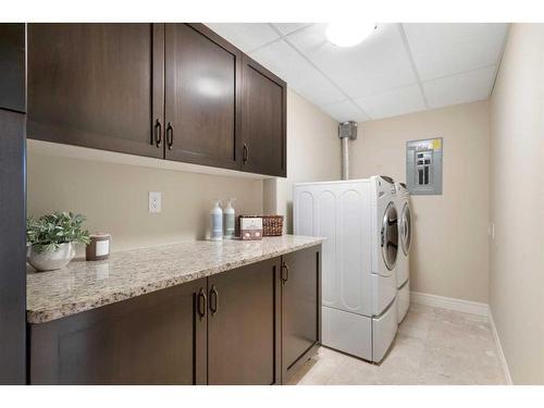 1442-2330 Fish Creek Boulevard Sw, Calgary, AB - Indoor Photo Showing Laundry Room