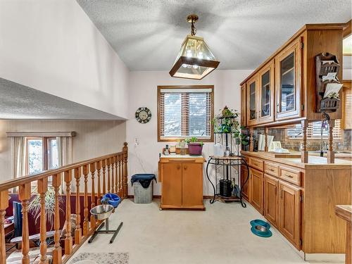 26 Carry Place Se, Medicine Hat, AB - Indoor Photo Showing Kitchen With Double Sink