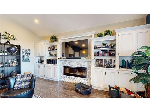 390 Somerside Crescent Se, Medicine Hat, AB - Indoor Photo Showing Living Room With Fireplace