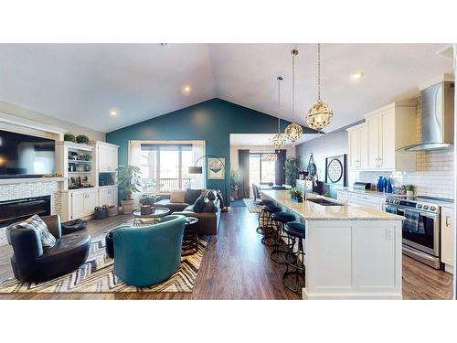 390 Somerside Crescent Se, Medicine Hat, AB - Indoor Photo Showing Kitchen With Fireplace With Upgraded Kitchen