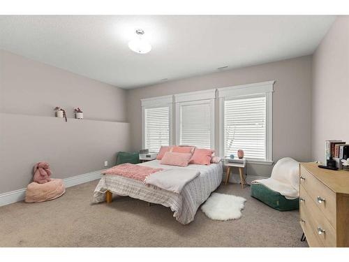 12 Links Place Sw, Desert Blume, AB - Indoor Photo Showing Bedroom