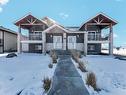 910 9 Avenue Se, Redcliff, AB  - Outdoor With Balcony With Facade 