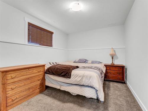 910 9 Avenue Se, Redcliff, AB - Indoor Photo Showing Bedroom