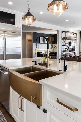 55 Desert Blume Gate, Desert Blume, AB - Indoor Photo Showing Kitchen With Double Sink With Upgraded Kitchen