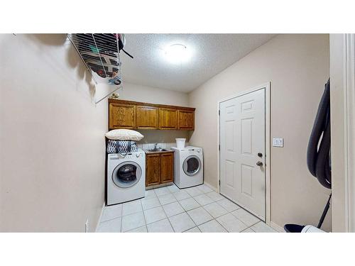 25 Vista Road Se, Medicine Hat, AB - Indoor Photo Showing Laundry Room