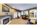 25 Vista Road Se, Medicine Hat, AB  - Indoor Photo Showing Living Room With Fireplace 