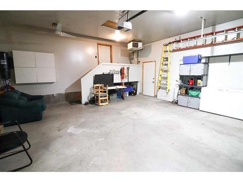 25 Vista Road Se, Medicine Hat, AB - Indoor Photo Showing Garage