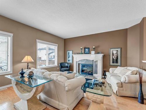 10 Ranchlands Lane Ne, Medicine Hat, AB - Indoor Photo Showing Living Room With Fireplace