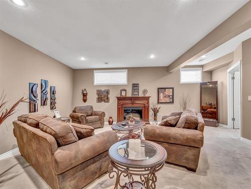 10 Ranchlands Lane Ne, Medicine Hat, AB - Indoor Photo Showing Basement With Fireplace