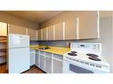 1741 14 Avenue Se, Medicine Hat, AB  - Indoor Photo Showing Kitchen With Double Sink 