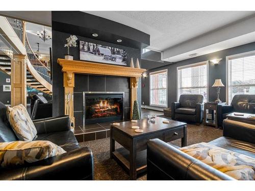 209-29 River Ridge Drive Nw, Medicine Hat, AB - Indoor Photo Showing Living Room With Fireplace