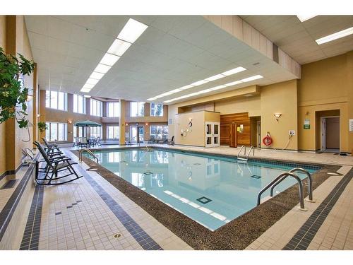 229-1182 Southview Drive Se, Medicine Hat, AB - Indoor Photo Showing Other Room With In Ground Pool
