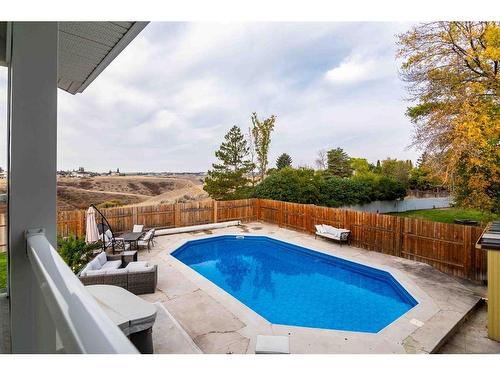 252 Seven Persons Drive Sw, Medicine Hat, AB - Outdoor With In Ground Pool With Backyard