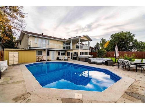 252 Seven Persons Drive Sw, Medicine Hat, AB - Outdoor With In Ground Pool With Deck Patio Veranda With Backyard With Exterior
