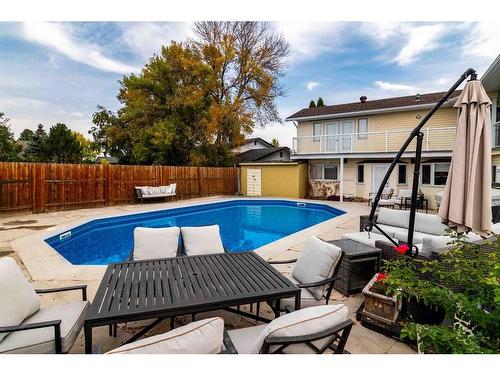 252 Seven Persons Drive Sw, Medicine Hat, AB - Outdoor With In Ground Pool With Deck Patio Veranda With Backyard