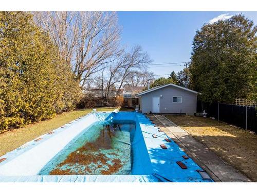 961 Bassett Crescent Nw, Medicine Hat, AB - Outdoor With In Ground Pool With Backyard