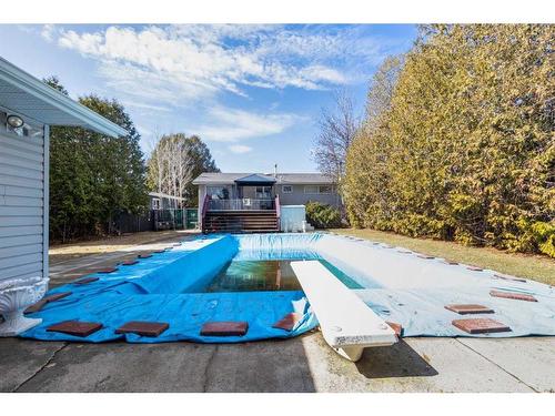 961 Bassett Crescent Nw, Medicine Hat, AB - Outdoor With In Ground Pool