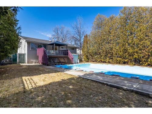961 Bassett Crescent Nw, Medicine Hat, AB - Outdoor With In Ground Pool With Deck Patio Veranda