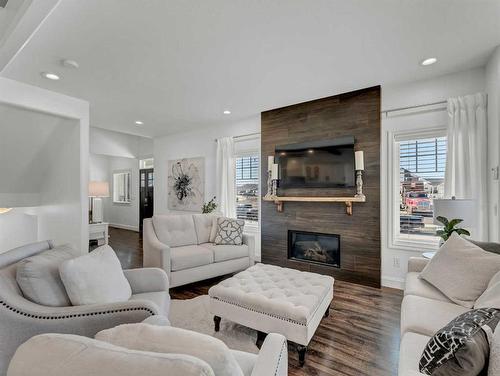 610 Somerside View Se, Medicine Hat, AB - Indoor Photo Showing Living Room With Fireplace