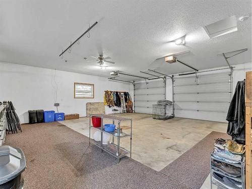 104063 Range Road 111, Bow Island, AB - Indoor Photo Showing Garage
