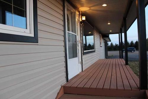 104063 Range Road 111, Bow Island, AB - Outdoor With Deck Patio Veranda With Exterior