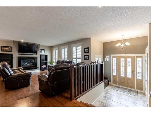 120 Seven Persons Crescent Sw, Medicine Hat, AB - Indoor Photo Showing Living Room With Fireplace