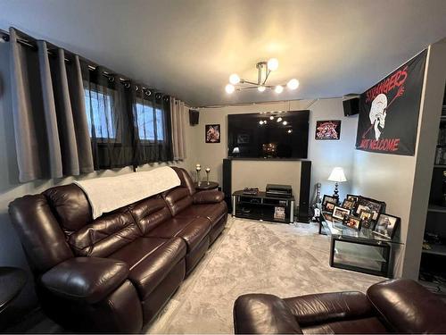 1946 15 Avenue Se, Medicine Hat, AB - Indoor Photo Showing Living Room With Fireplace