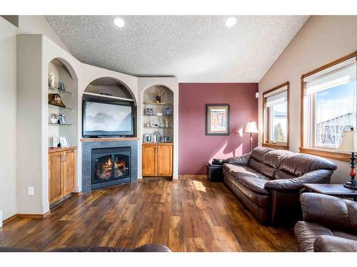 220 Vista Road Se, Medicine Hat, AB - Indoor Photo Showing Living Room With Fireplace