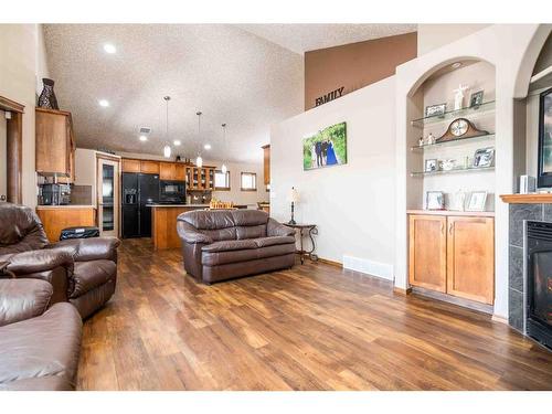 220 Vista Road Se, Medicine Hat, AB - Indoor Photo Showing Living Room With Fireplace