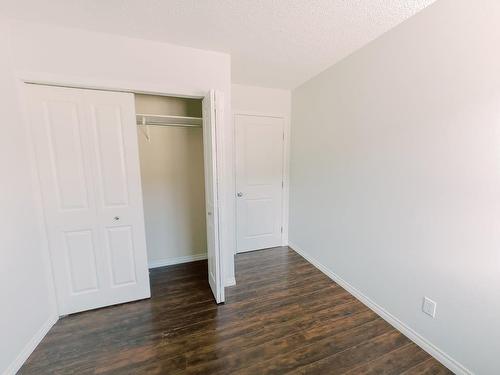 4916A And 4916B 53 Street, Stettler, AB - Indoor Photo Showing Other Room