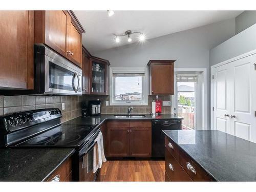 357 Somerset Row Se, Medicine Hat, AB - Indoor Photo Showing Kitchen With Double Sink