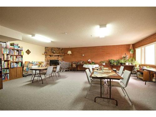138-1480 Southview Drive Se, Medicine Hat, AB - Indoor With Fireplace