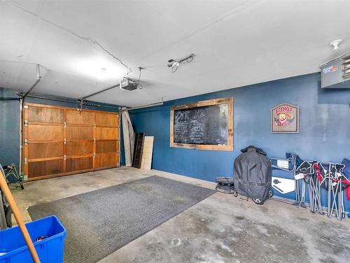 83 Hamilton Court Ne, Medicine Hat, AB - Indoor Photo Showing Garage