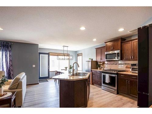 382 Sterling Crescent Se, Medicine Hat, AB - Indoor Photo Showing Kitchen With Double Sink