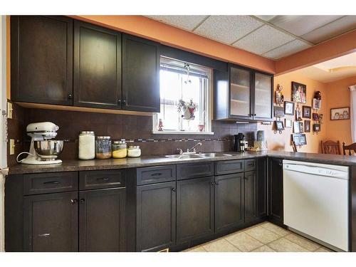 102 3 Street Sw, Medicine Hat, AB - Indoor Photo Showing Kitchen With Double Sink