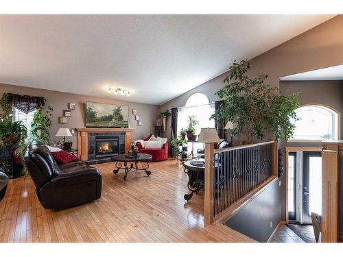 306 2 Avenue East, Oyen, AB - Indoor Photo Showing Living Room With Fireplace
