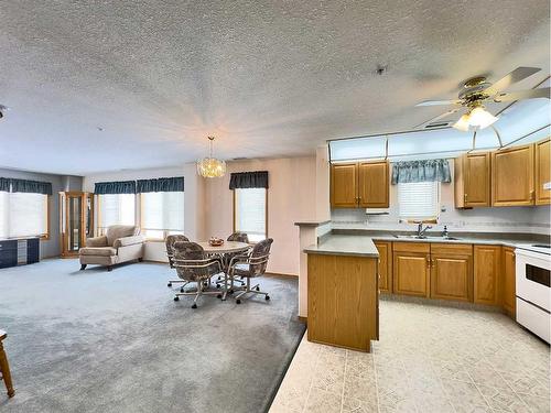 229-1182 Southview Drive Se, Medicine Hat, AB - Indoor Photo Showing Kitchen With Double Sink