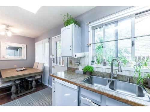 228 Seven Persons Drive Sw, Medicine Hat, AB - Indoor Photo Showing Kitchen With Double Sink